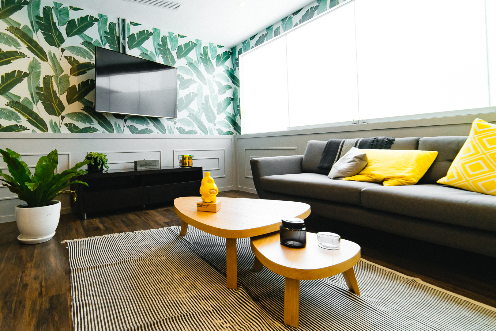 Image of an apartment interior with yellow and green accents